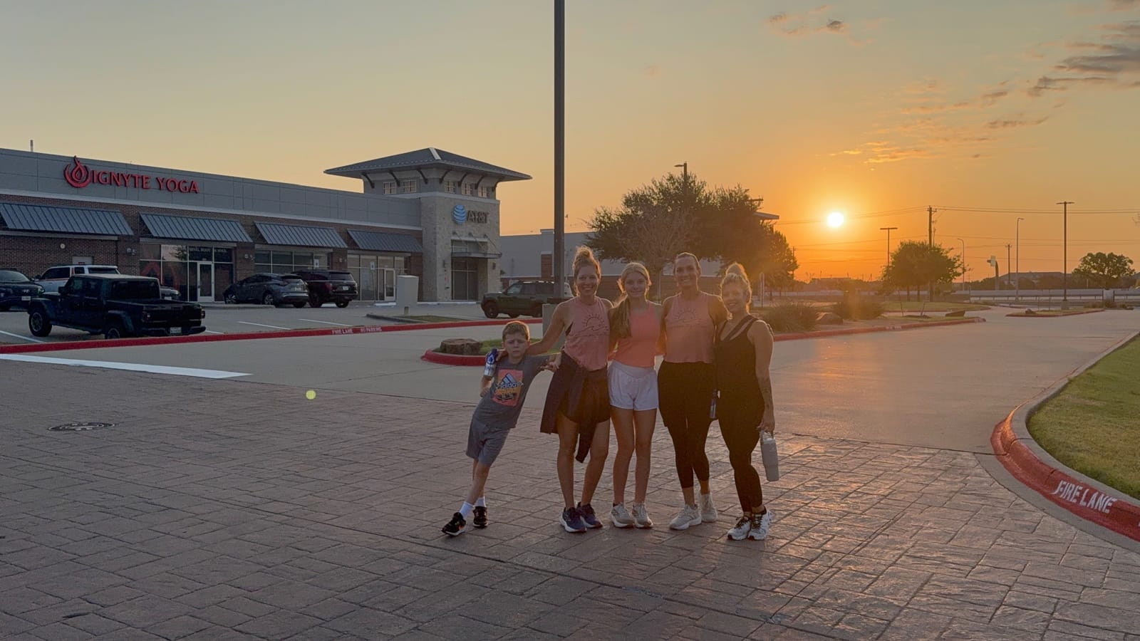 Ignyte Sunrise Walk group outside the studio at sunrise